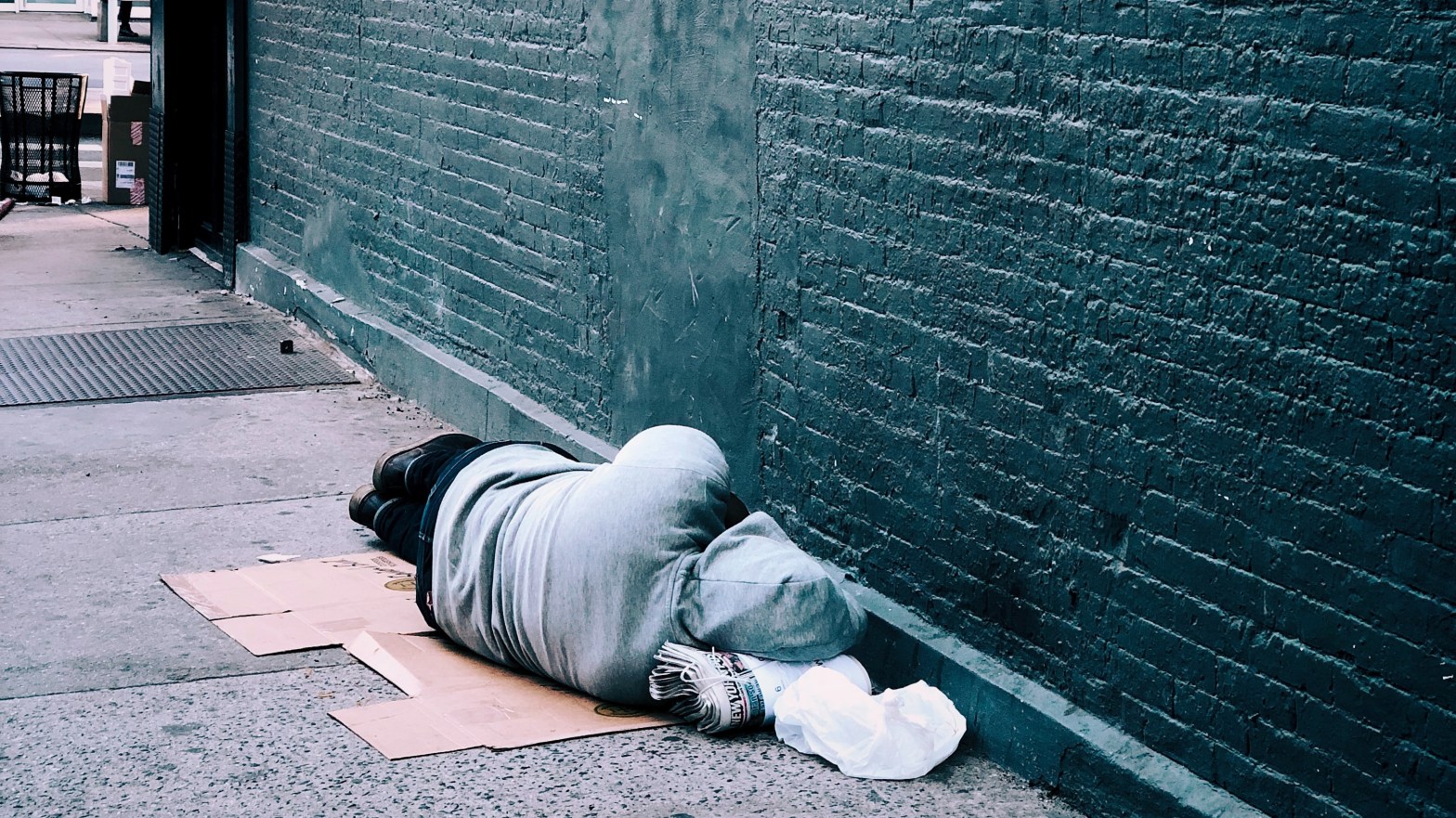 Person Experiencing Homelessness, Photo by Jon Tyson on Unsplash